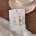 Deliziose mollette per capelli con fiocco floreale e perle, fermagli dolci per styling quotidiano. - Piccolo Fiore Con Fiocco Giallo