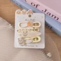 Cute puppy acrylic hair clip set with duckbill design for sweet daily hairstyles detail view - Style 3 Yellow Figure-8 Duckling