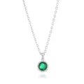 Detailed view of the elegant silver chain necklace featuring a sparkling green gemstone pendant. - Silver May