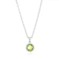 Close-up view of a green gemstone pendant necklace with a delicate silver chain. - Silver August