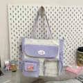 Detailed view of the cute polka dot canvas tote bag with multiple pockets and purple contrast. - Bag Only (No Charm) / Light Purple