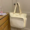 Grande borsa shopper tote gialla con tasca frontale in rete per l'uso quotidiano. - Beige