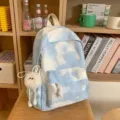 Zaino scolastico blu sfumato nuvola con portachiavi peloso a pompon per viaggio e scuola. - Blu Piccolo