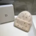 Detailed close-up view of women rhinestone fuzzy knit beanie hat, cozy winter warm plush cap. - One Size / Pink
