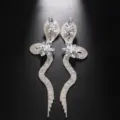 Exquisite glitzernde Schlangen-Ohrringe mit Strass und Kristallblumen für elegante Event-Looks. - Silber Farbe Weißer Strass Ohrringe
