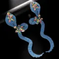 Ubertriebene blaue Strass Schlangen Ohrringe, schillernde Kristall Tropfen Modeschmuck. - Gold Blaue Strass Ohrringe