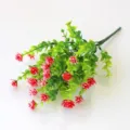 Detail view of artificial plastic eucalyptus leaves and red flower bouquet for wall decor. - Eucalyptus Flowers (Red)