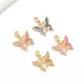 Vista detallada de dijes de mariposa de esmalte con pedrería de cristal y cierre metálico. - Estilo 4 / Paquete de 4