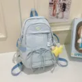 Light blue nylon casual student backpack with cute ribbon and bear pendant variant. - With Pendant / Blue