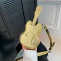 Gold guitar-shaped crossbody bag, stylish shiny PU leather shoulder bag for cool girls. - Guitar Shape / Gold