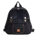 Dark denim backpack detailed view, vintage casual school bag with metal buttons and pockets. - Black