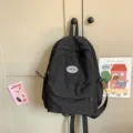Schwarzer Mini Nylon Rucksack für Damen, lässige Schul- und Freizeittasche für den Alltag. - Einheitsgröße / Schwarz