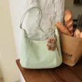 Chic light green shoulder bag with cute bear pendant, stylish casual hobo tote for daily wear. - With Pendant / Green