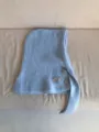 Cozy knit balaclava detail, warm wool blend winter hood scarf with buttons and label. - Light Blue
