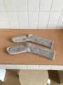Dicke Wollstrick Slouch Socken für Damen, warme Wintersocken in Melange-Haferflockenfarbe. - Gebrochenes Weiß