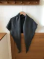 Dark grey woolen triangle scarf detail, soft texture and chic fringe edge design. - Gray