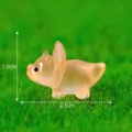 Figurine miniature de dinosaure en resine lumineuse pour decor de jardin et de mousse. - Orange