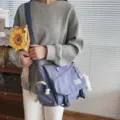 Casual Japanese style canvas messenger bag with large capacity, perfect for students daily use. - With Bear Pendant / Blue