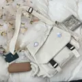 Detail view of Japanese casual canvas crossbody bag, featuring double buckles and spacious storage. - No Pendant / White