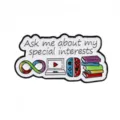 Creative metal enamel pin featuring neurodiversity rainbow infinity symbol, books and game controller. - Game Book Special Interests (D10-1-105)
