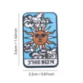 Close-up detail of tarot sun enamel pin, vintage badge design with clear lines and vibrant colors. - Sun