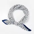 Detail view of a fashionable pleated square neck scarf with black and white chevron pattern. - Pleated Style / Blue and White Stripes