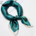 Dark green silk square scarf with classic horsebit print and elegant contrast border. - Green