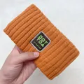 Orange ribbed knitted headband for women, cozy winter hair band for daily face washing. - Orange Red