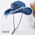 Distressed denim cowboy bucket hat with frayed brim and adjustable chin strap. Great sun hat. - Dark Blue