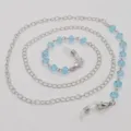 Catena in metallo argentato con perline di cristallo azzurro per occhiali e maschera anti-smarrimento - Blu