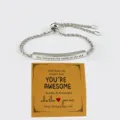 Bracciale in acciaio inossidabile con corda regolabile barra incisa motivazionale con bella carta - Lei credeva di poterlo fare e l'ha fatto / Argento