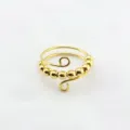 Goldener Titanstahl Spinner Ring mit beweglichen Perlen, Angstabbau und Entspannungsdetail. - Gold