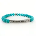 Bracciale di perle in pietra turchese inciso con tubo in acciaio per abbigliamento quotidiano - Turchese blu e tubo curvo argentato