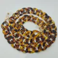 Catena per occhiali in acrilico tartaruga e cordino per maschera stampa leopardo retrò. - Ambra