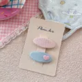 Pastel pastoral style hair clips set for girls in pink plaid and light blue heart design - Oval Light Blue Heart Embroidery