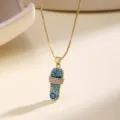 Gold box chain necklace with blue enamel evil eye slipper pendant, stylish jewelry piece. - Light Blue