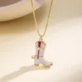 Gold chain necklace with white enamel cowboy boot pendant and heart detail for women fashion - White