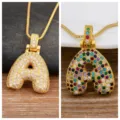 Gold bubble letter A pendant necklace featuring sparkling micro-pave cubic zirconia stones. - Gold / Letter A