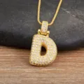 Gold-plated initial D pendant necklace featuring sparkling cubic zirconia stones for women. - Letter D
