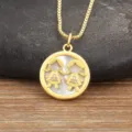 Gold-plated double girl pendant necklace with white mother of pearl and cubic zirconia. - 2 Girls