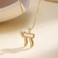 Close-up detail shot of the gold Hebrew Chai good luck symbol pendant necklace charm. - Gold Arc Symbol Style (N2151)