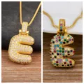 Gold pave cubic zirconia letter E pendant necklace for women, stylish bubble alphabet jewelry variant. - Letter E