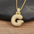 Exquise collier avec pendentif lettre G plaqué or 18k, scintillant de zircons cubiques. - Lettre G