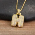 Collier avec pendentif lettre H plaqué or étincelant avec de belles pierres zircon. - Lettre H