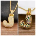 Gold-tone letter J bubble pendant necklace featuring micro-paved sparkling colorful cubic zirconia. - Letter J