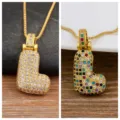 Gold letter L bubble pendant necklace with sparkling pave cubic zirconia and colorful gemstones. - L