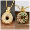 Gold-plated donut pendant necklace featuring colorful zirconia stones. Variant jewelry design. - Letter O
