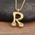 Gold plated letter R pendant necklace with sparkling micro-pave cubic zirconia stones. - Letter R