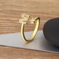 Gold plated open letter M ring featuring sparkling cubic zirconia stones for women fashion jewelry. - M