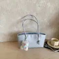 Minimalist solid color tote shoulder bag with cute bear pendant for women daily commuting. - Blue